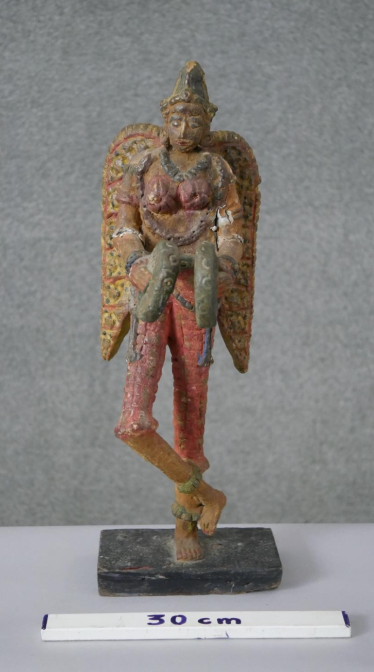 South American winged figure on base